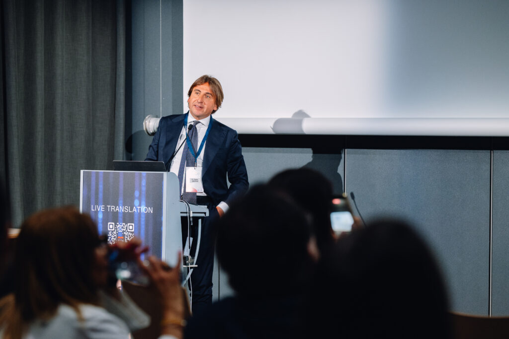 AIME 2026 : orateur sur scène face au public