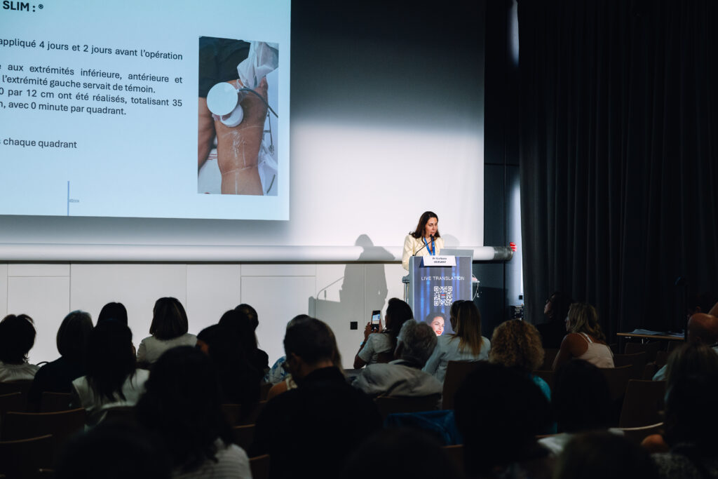 AIME 2026 : conférence en salle avec projection et public